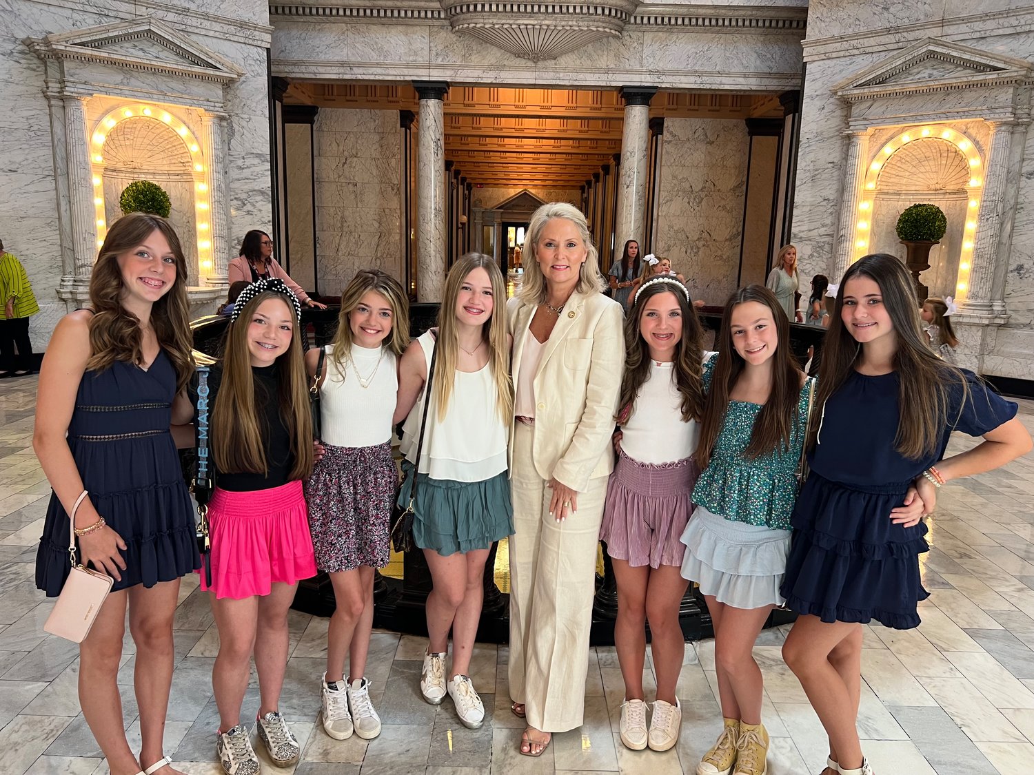 Participants of the third annual Girl's Day at the Capitol on June 17 pose with State Rep. Jill Ford. Pictured, from left: Naomi Olszewski, Ava Bondurant, Sloane Clack, Bella Brown, Rep. Jill Ford, Annie Craig, Lizzie Kate Herrington, and Addison Kellum.